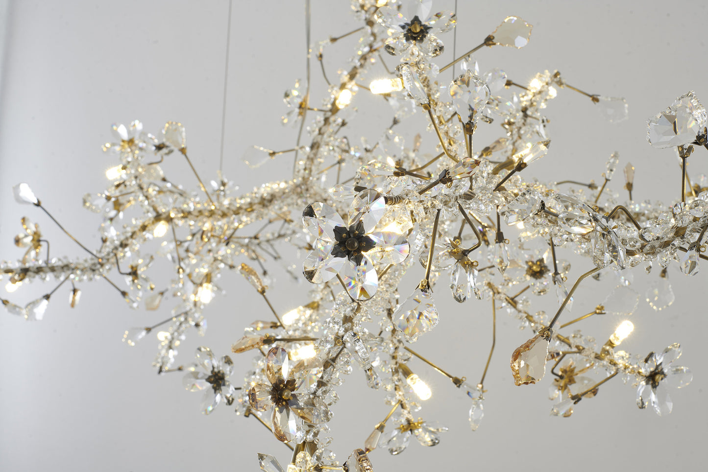 30-Light 70" Gold Stainless Steel Chandelier With Clear and Champagne CrystalsBy Design Living