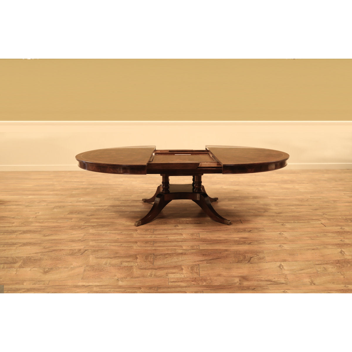 Mahogany Pedestal Table With Self-storing Leaf Seats 6-12