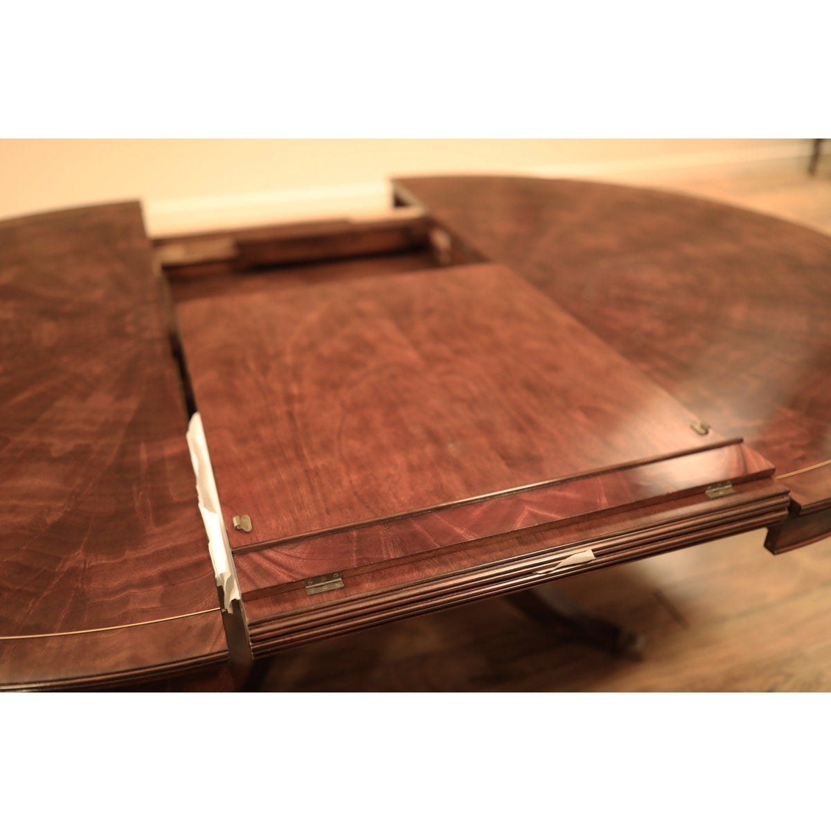 Mahogany Pedestal Table With Self-storing Leaf Seats 6-12