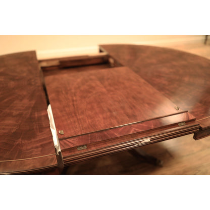 Mahogany Pedestal Table With Self-storing Leaf Seats 6-12