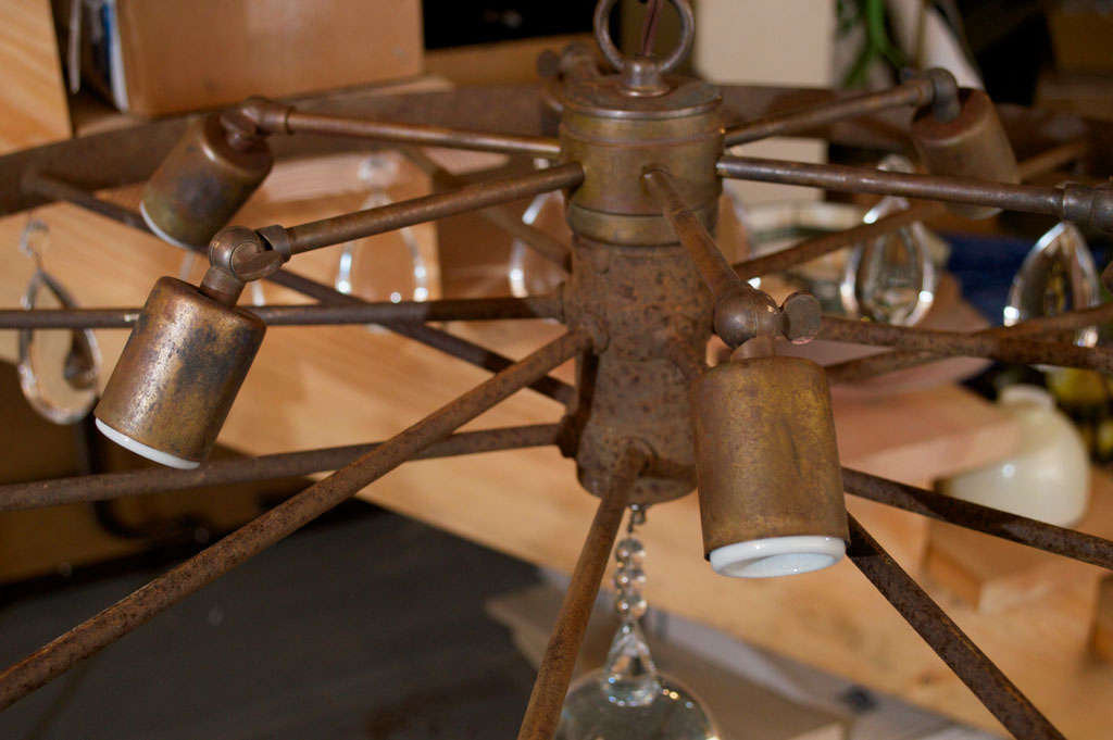 Rusted Wagon Wheel ChandelierBy EcoFirstArt