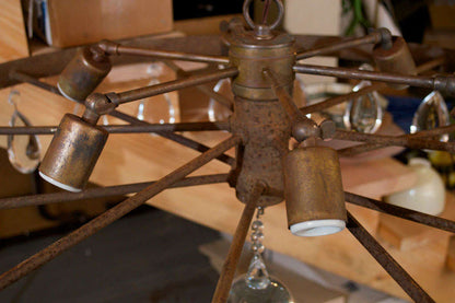 Rusted Wagon Wheel ChandelierBy EcoFirstArt