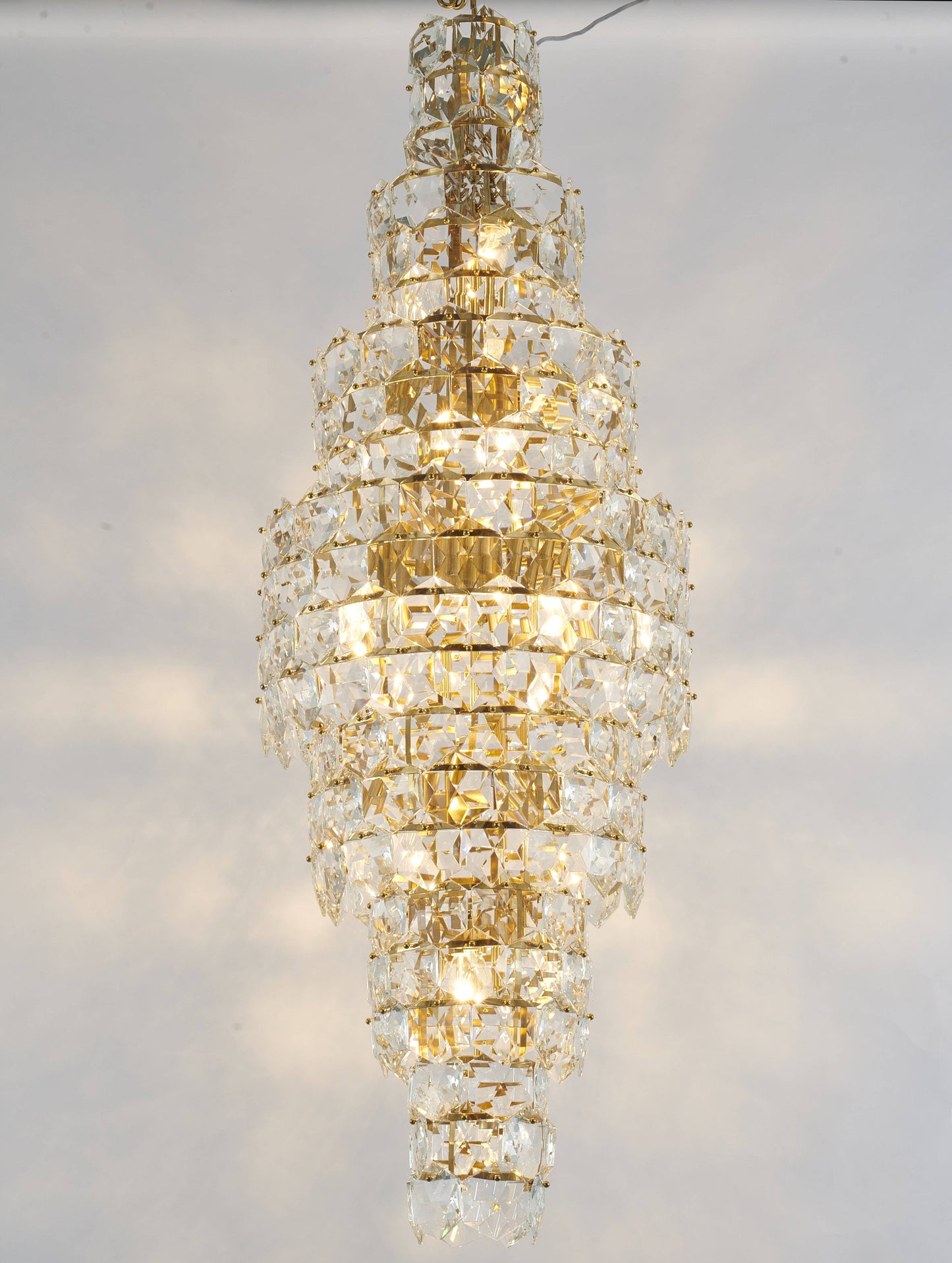 7 Tier Brass Frame Chandelier With Clear Hanging CrystalsBy Design Living